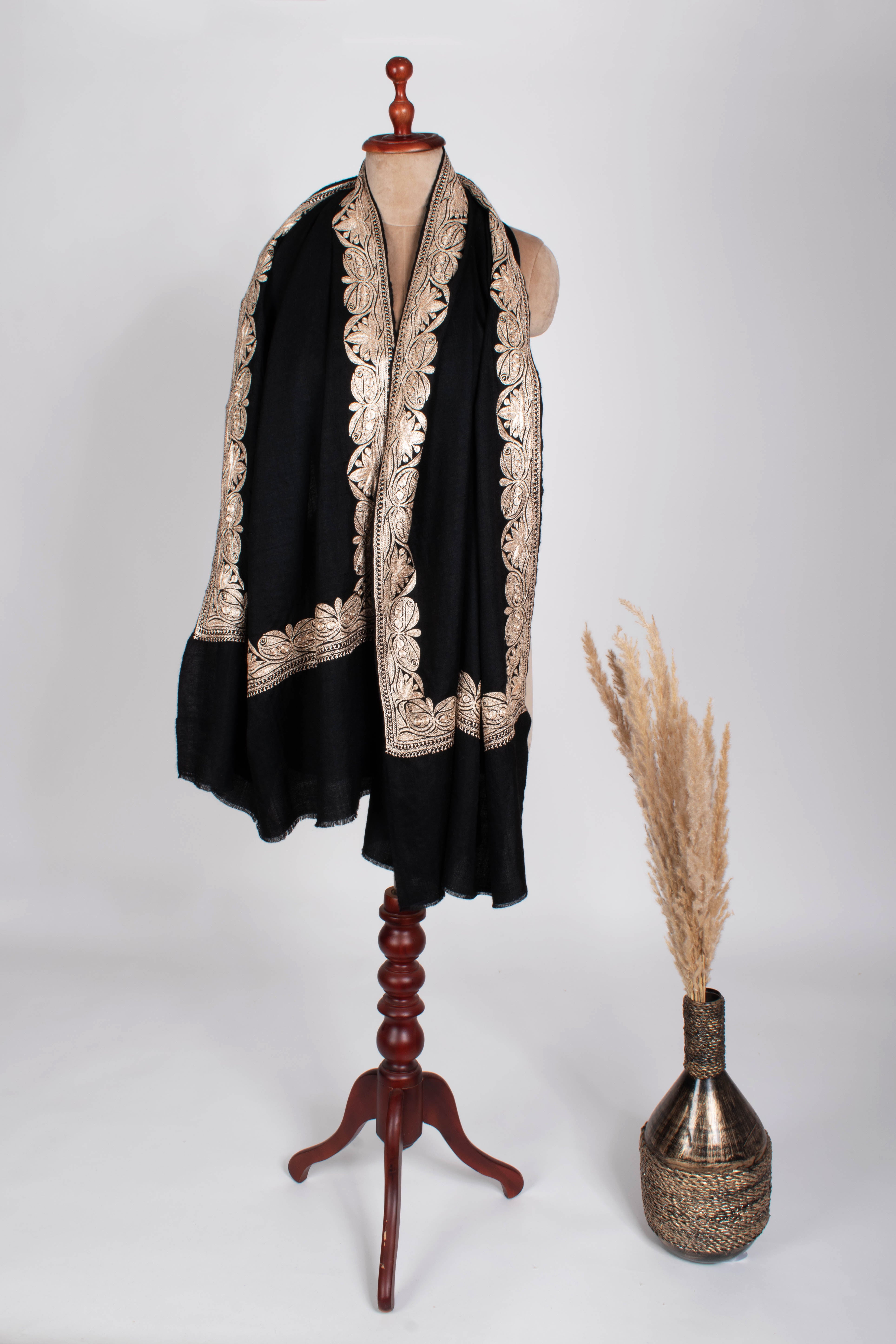 Black Pashmina Wrap adorned with Water Gold Zari Embroidery.