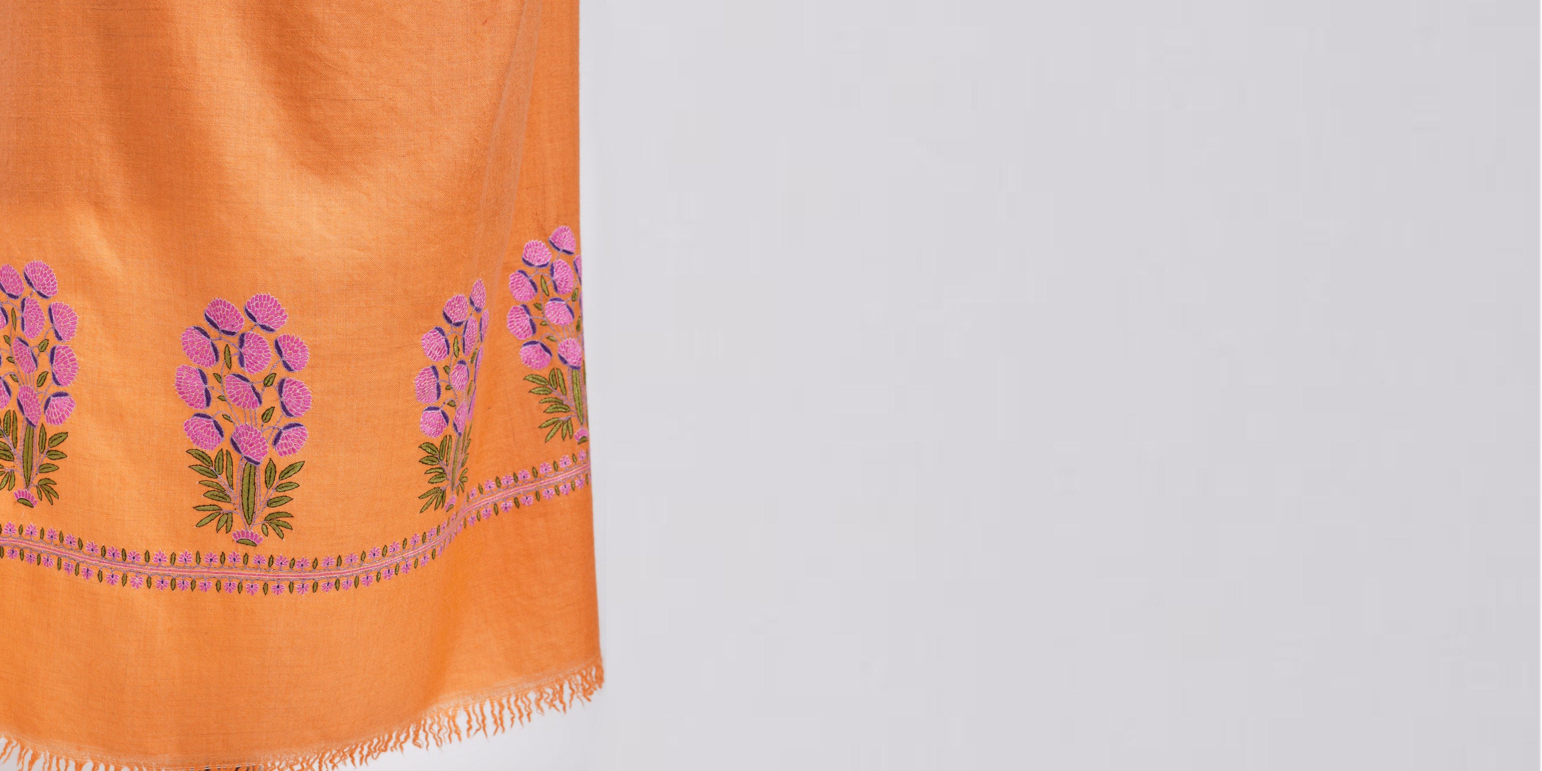 Orange pashmina shawls by Shahkaar - Luxurious and elegant shawls featuring a rich orange color, ideal for stylish winter wear.