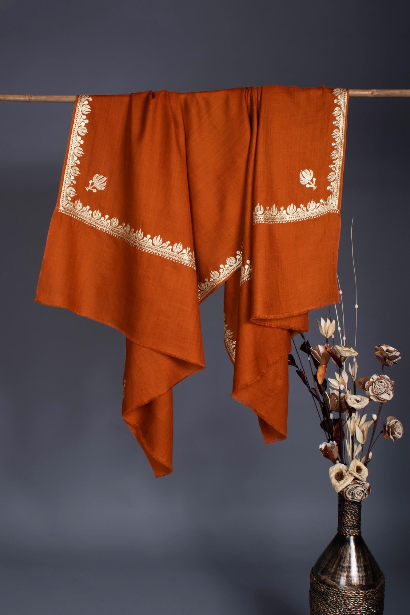 Rust Pashmina Wrap adorned with a Lotus Motif Tilla - BHANDARIA